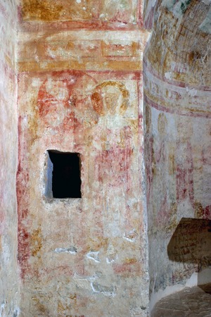 Zidne slike, svetica na zidu uz apsidu