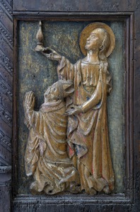 Korske klupe, desno krilo, reljef biskupa donatora sa svetom Magdalenom