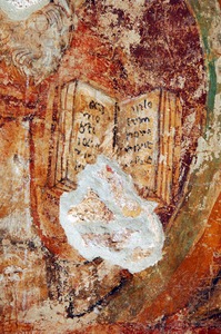 Zidna slika sveca s modelom crkve i knjigom u medaljonu