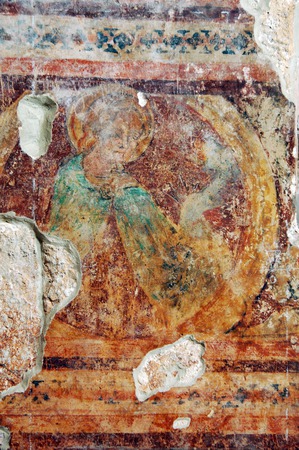 Zidna slika svetice u medaljonu